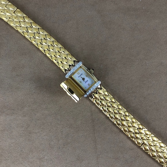 Vintage Armitron “Now” Peak a Boo Bracelet Watch
